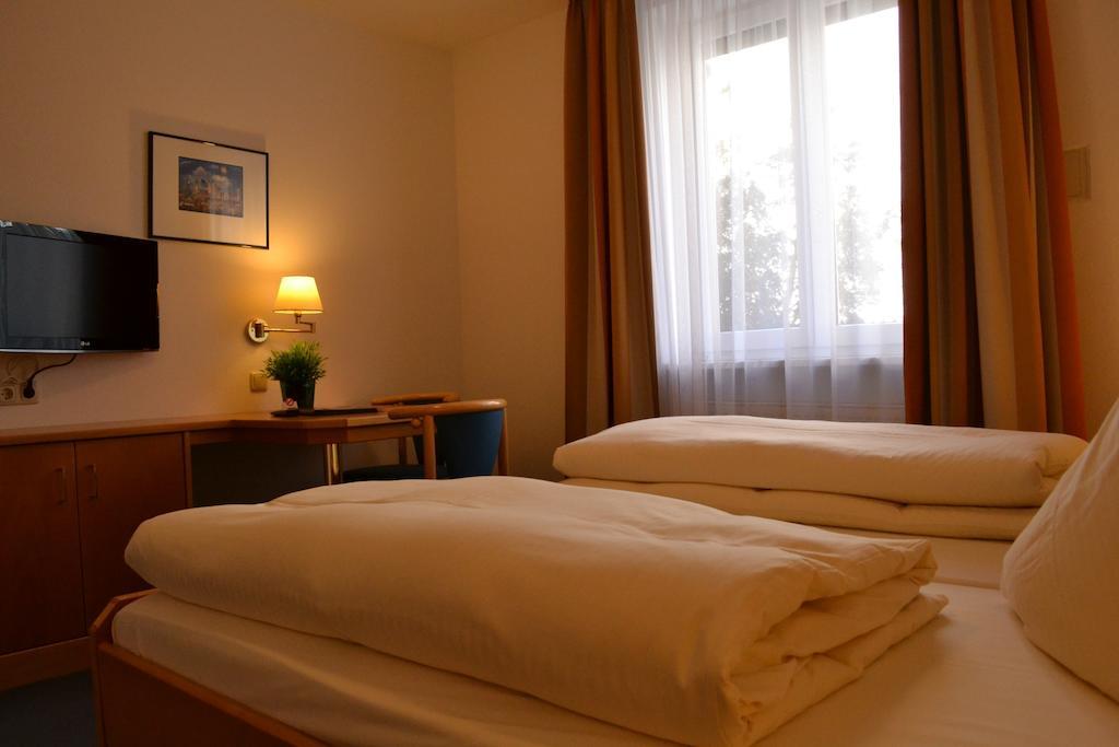 Hotel Am Ostpark Нойбіберг Номер фото